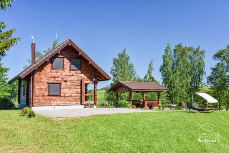 Brīvdienu mājiņas ezera krastā – Lauku seta Peldošās salas in Zarasu rajonā