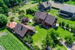 Lauku sēta Rusnes salā uz Vecās Rusnes upes krasta