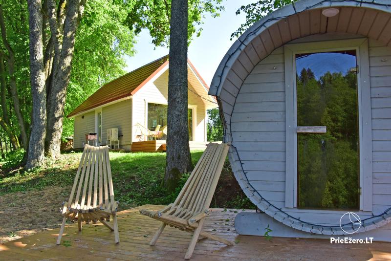 Jauna brīvdienu māja īrei ezera krastā Kiauklių Oazė. Ir pirts, kubls