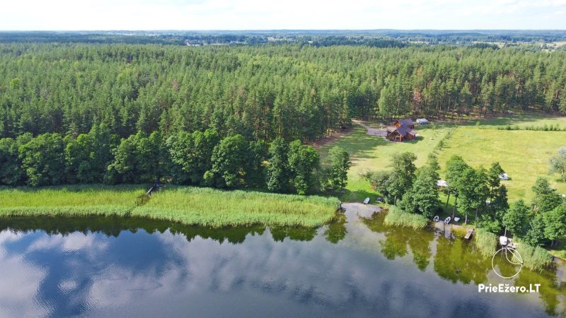 Nakšņošana pie ezera - izīrē nelielas mājiņas