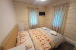 Divvietīga vasarnīca pie ezera priežu mežā - 4